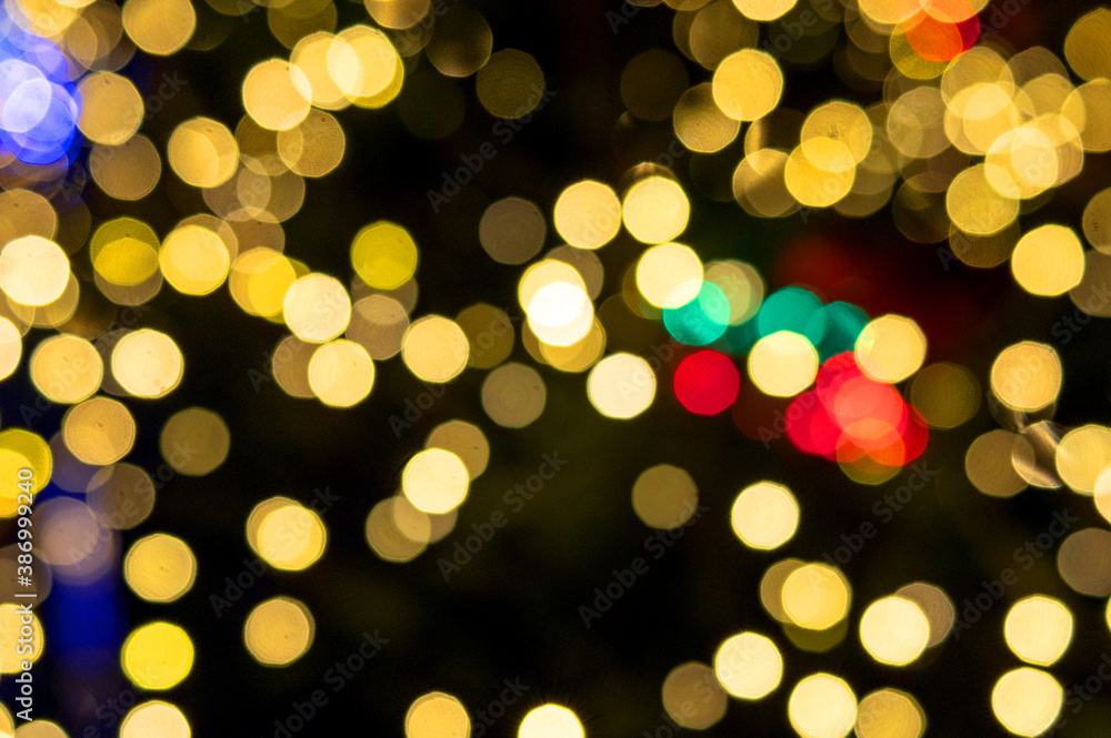 Bright bokeh from the lights of the Christmas tree Bright bokeh from the lights of the Christmas tree