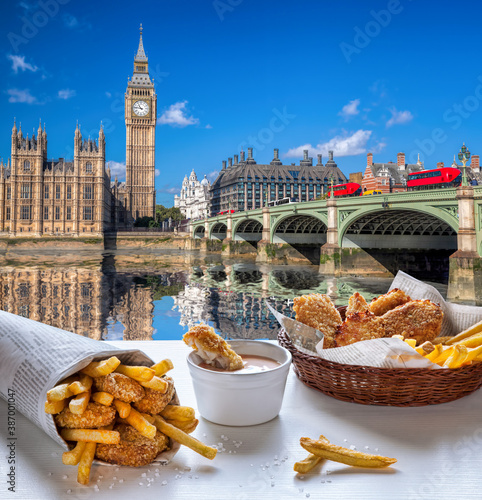 Canvas Print Big Ben against fish and chips served on the table in London, England, United Ki