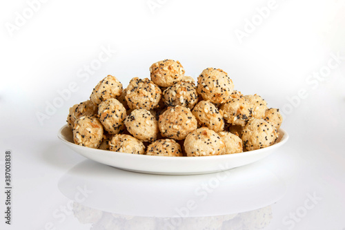 Cereal balloons with poppy seeds and sesame seeds on a plate healthy food