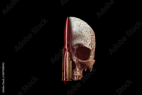 Bloody human skull isolated on black background . Still life blood and bullet. Copy space. photo