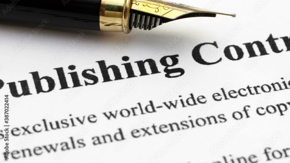 Fountain pen on publishing contract dolly shot. Fountain pen on publishing contract dolly shot.