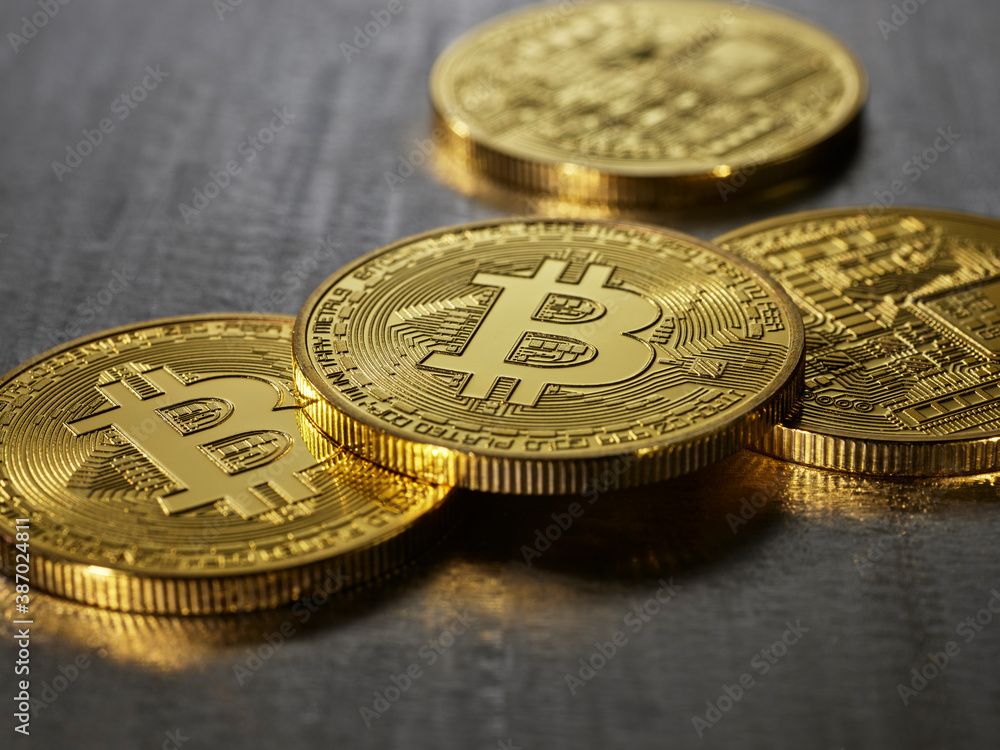 Bitcoins piled on top of each other Bitcoins piled on top of each other