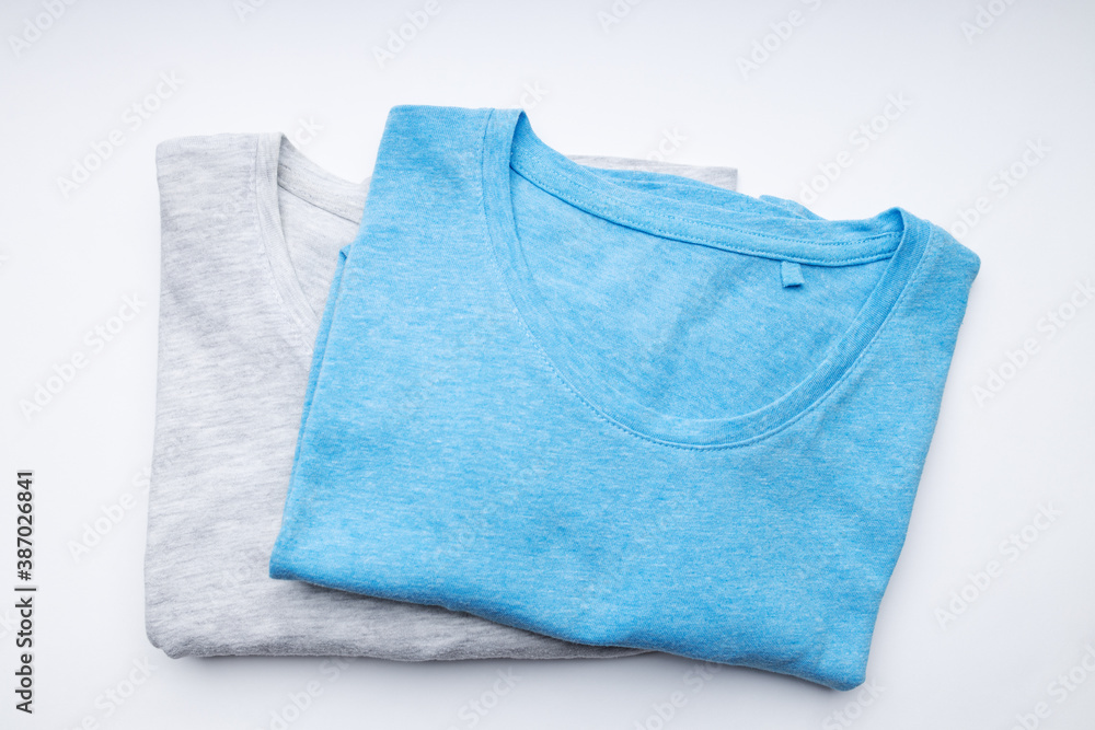 blank folded t-shirt on a white background. branding template. above view blank folded t-shirt on a white background. branding template. above view