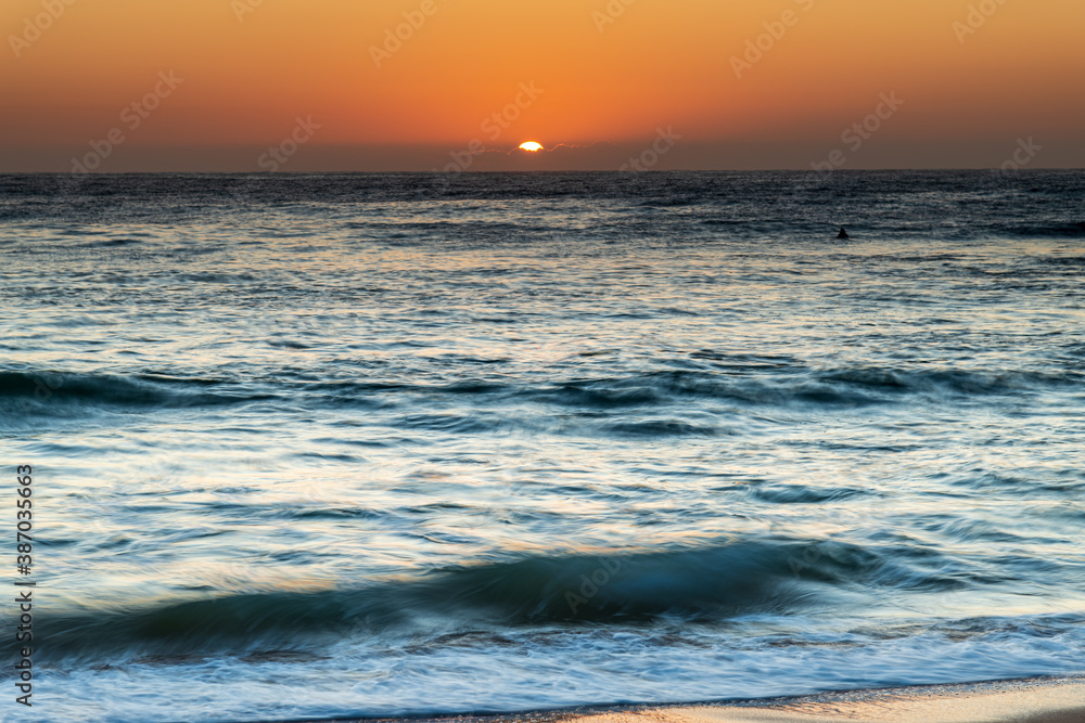 Clear skies sunrise seascape