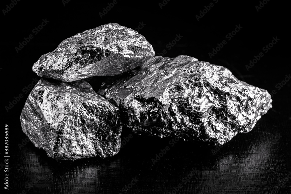 Fototapeta premium silver ore, silver nuggets isolated on black background