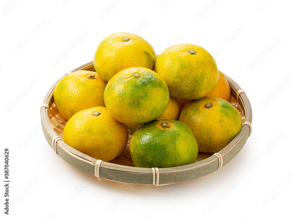 Early Japanese mandarin oranges on a white background Early Japanese mandarin oranges on a white background