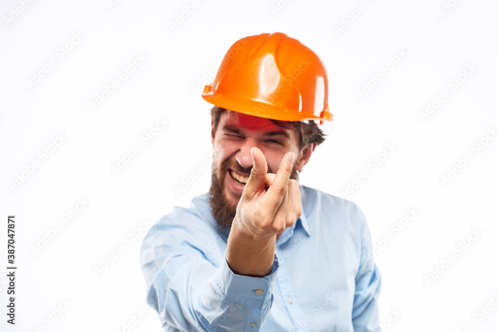 Emotional man in orange paint construction industry work lifestyle Emotional man in orange paint construction industry work lifestyle
