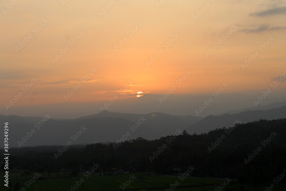 Sunset background. landscape view of sunset on mountain. Sunset background. landscape view of sunset on mountain.