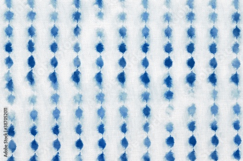 Indigo Blue Shibori Tie dye fabric texture pattern. White and Blue colors.