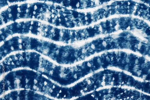Indigo Blue Shibori Tie dye fabric texture pattern. White and Blue colors.