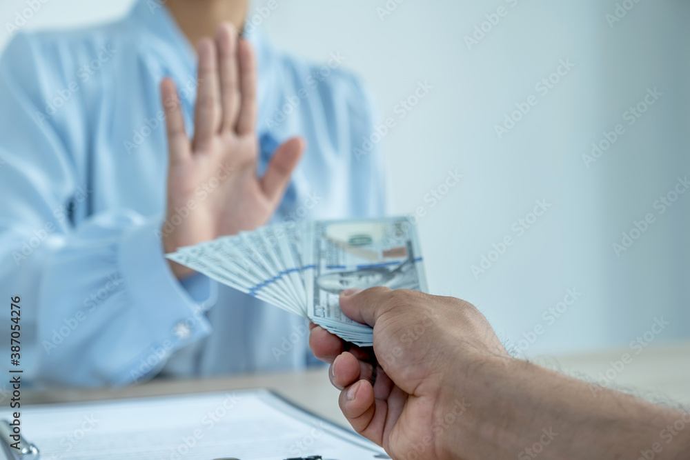 Government officials refused to accept bribes from the businessmen offer for signing in a contract of business project, concept of corruption and anti bribery Government officials refused to accept bribes from the businessmen offer for signing in a contract of business project, concept of corruption and anti bribery