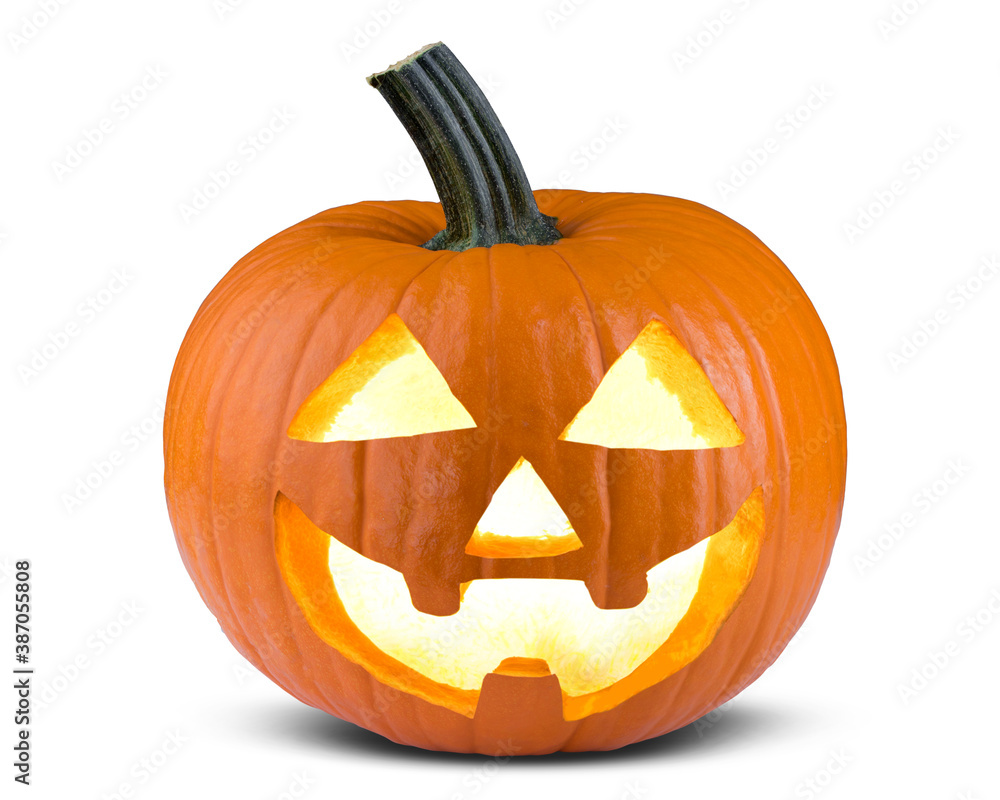 Carved Pumpkin on Halloween. Jack O Lantern with burning candle inside. Happy Halloween. Scary night on October 31. Isolated white background.