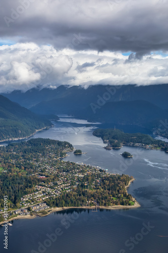 Aerial view of an Ocean Inlet in a modern city during a cloudy morning. Taken in Deep Cove, Vancouver, British Columbia, Canada. © edb3_16