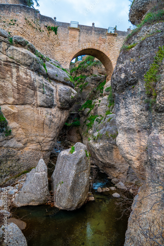 Low angle view of Old Bridge of Ronda, Spain