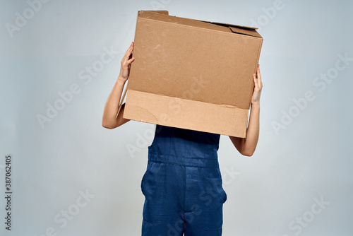 Woman in working uniform box packing service lifestyle