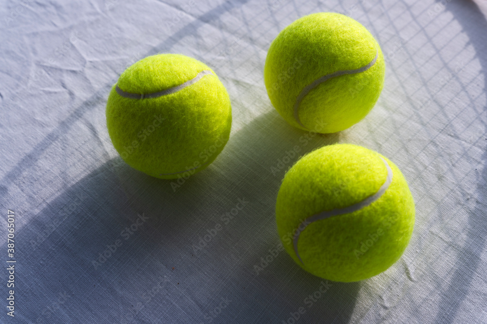 Vibrant tennis balls on background.