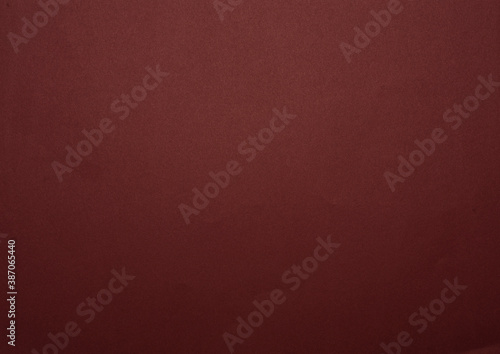 red paper background with space