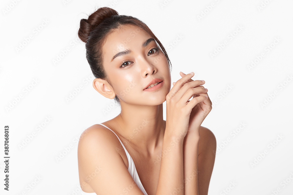 Beautiful young asian woman with clean fresh skin on white background, Face care, Facial treatment, Cosmetology, beauty and spa, Asian women portrait Beautiful young asian woman with clean fresh skin on white background, Face care, Facial treatment, Cosmetology, beauty and spa, Asian women portrait