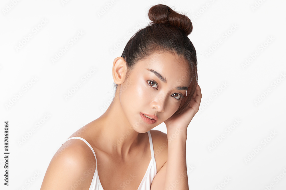 Beautiful young asian woman with clean fresh skin on white background, Face care, Facial treatment, Cosmetology, beauty and spa, Asian women portrait Beautiful young asian woman with clean fresh skin on white background, Face care, Facial treatment, Cosmetology, beauty and spa, Asian women portrait