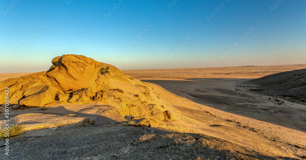 Landscape in Vogelfederberg, interesting rock formation in Namib desert in sunset, Namibia wilderness, Africa nature