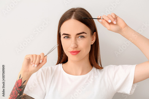 Young woman with tools for ...