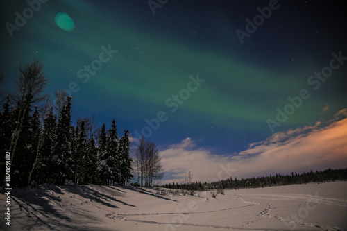 Northern Lights on a full moon night, Fairbanks, Alaska © youli