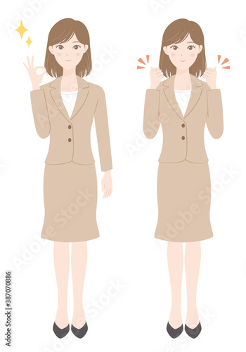スーツ姿の女性　OKポーズ　ガッツポーズ