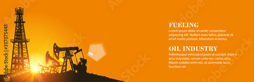Darck silhoutte of oil rig and pumps during sunset.