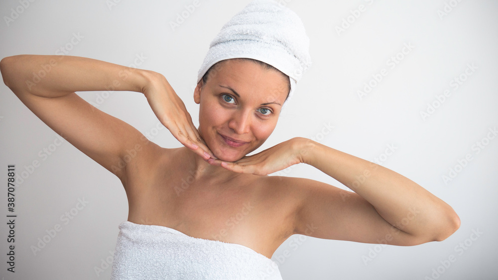 Caucasian woman in towel after shower. Caucasian woman in towel after shower.