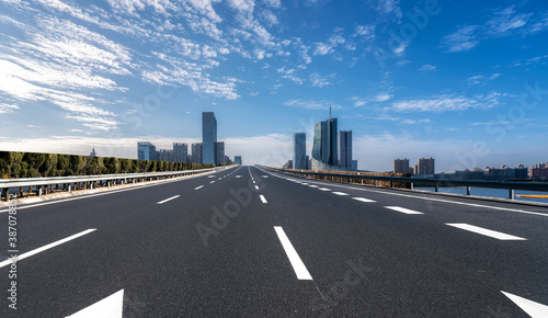 Road ground and modern architectural landscape skyline of Chinese city