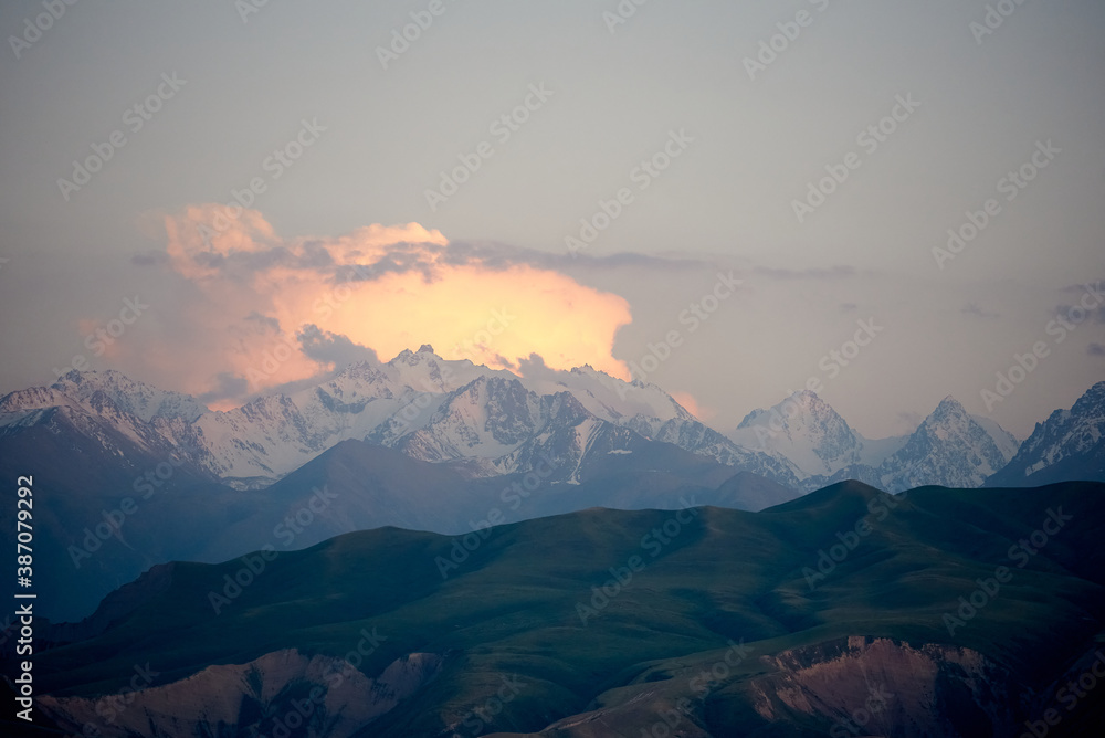 Evening view on summer landscape with mountains