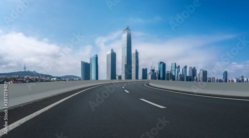 Road ground and modern architectural landscape skyline of Chinese city