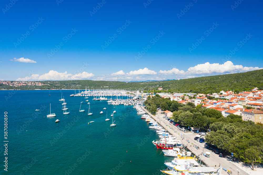 Coastline in town of Punat on Krk island, Kvarner bay, Croatia, aerial view from drone