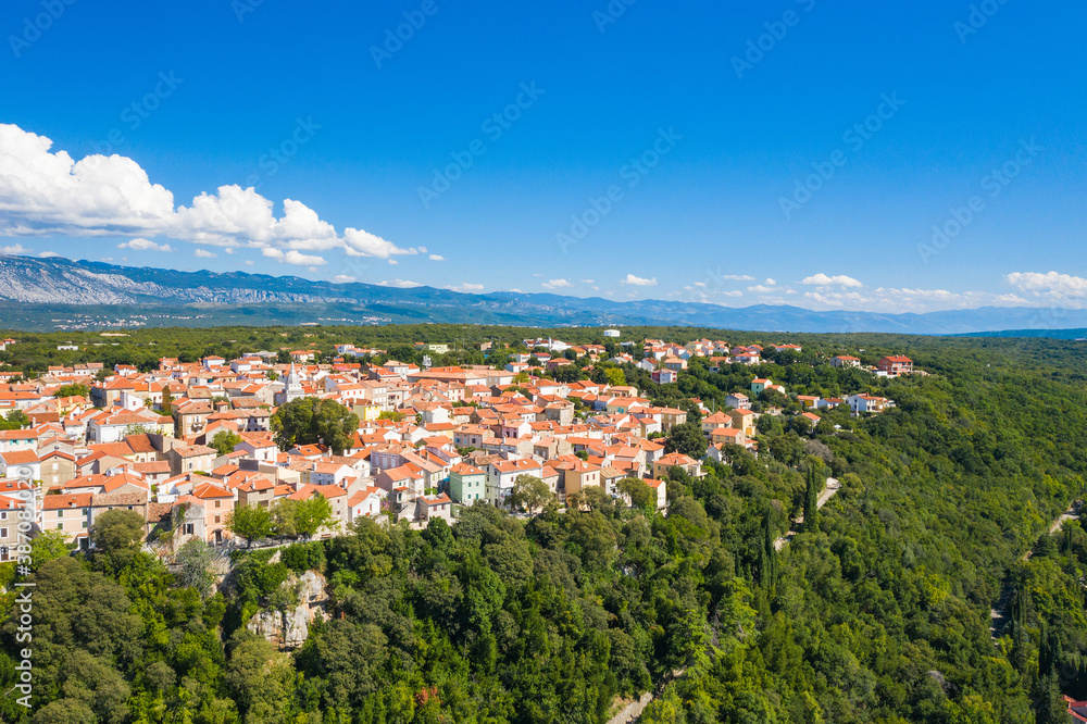 Aerial view of the old town of Omisalj on high cliff, Krk island, Kvarner, Croatia