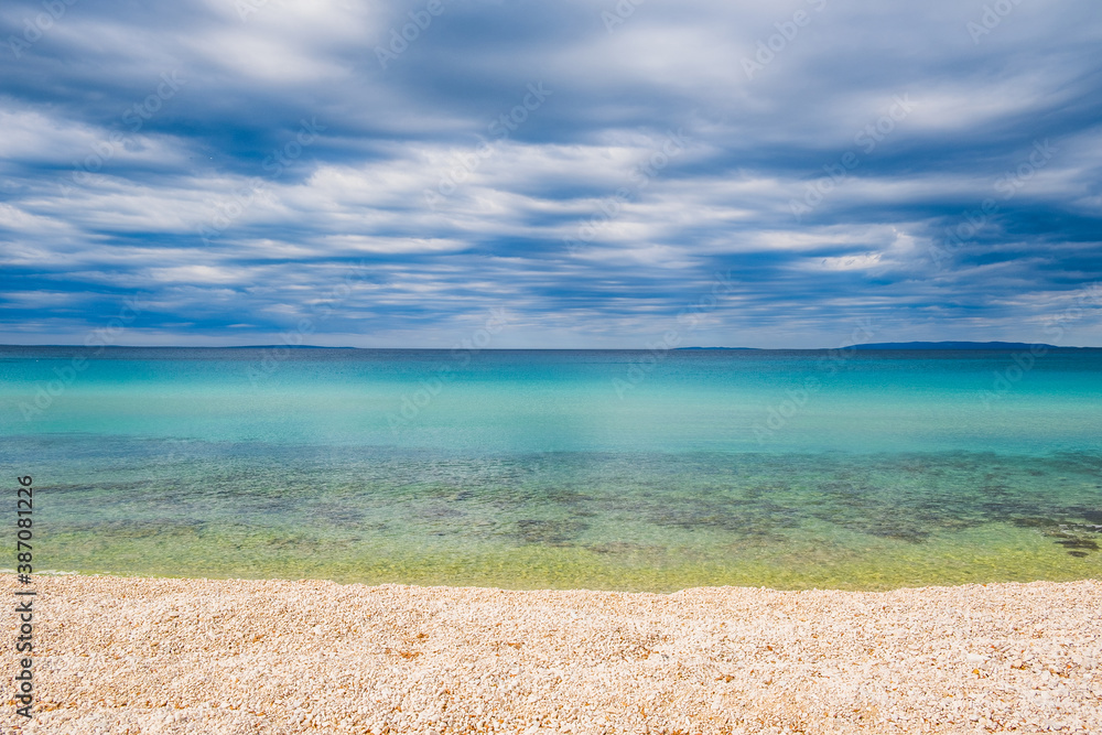 Croatia, island of Pag, Adriatic Sea shore and cloudy sky over horizon Croatia, island of Pag, Adriatic Sea shore and cloudy sky over horizon