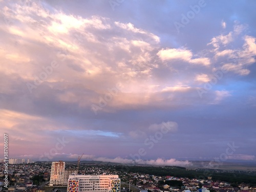 time clouds over city
