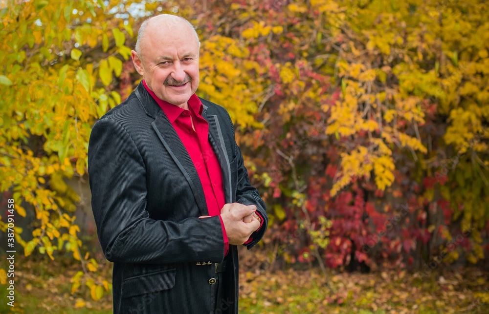 Elegant suit with marsala shirt and black jacket for seniors , lifestyle of older people Elegant suit with marsala shirt and black jacket for seniors , lifestyle of older people