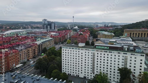 The Scandinavium, Gothia Towers, Ferris Wheel, And AtmosFear At Liseberg Amusement Park Seen From The Lorensberg In Gothenburg, Sweden. - aerial drone shot photo