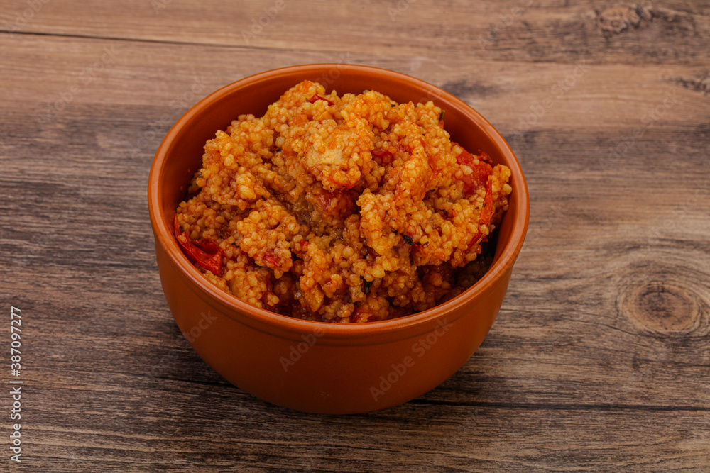 Couscos with tomato and chicken Couscos with tomato and chicken