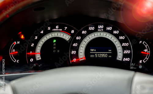 car dashboard with speedometer