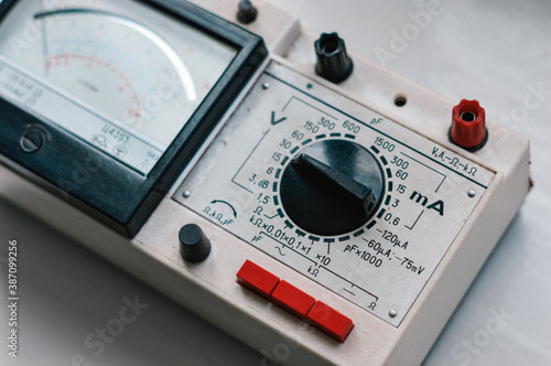 Analog multimeter. An old Soviet measuring device.  photo