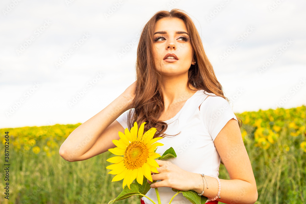 woman in the sunflower field woman in the sunflower field