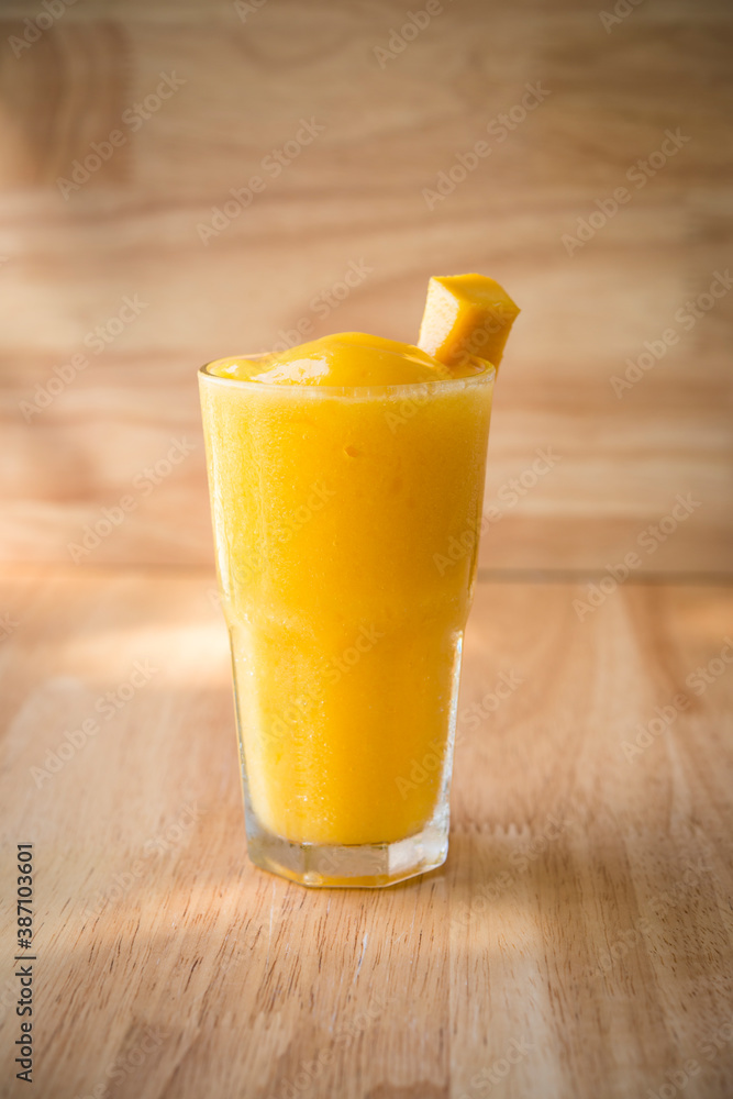 Mango Fruit shake with piece of mango for decor Mango Fruit shake with piece of mango for decor