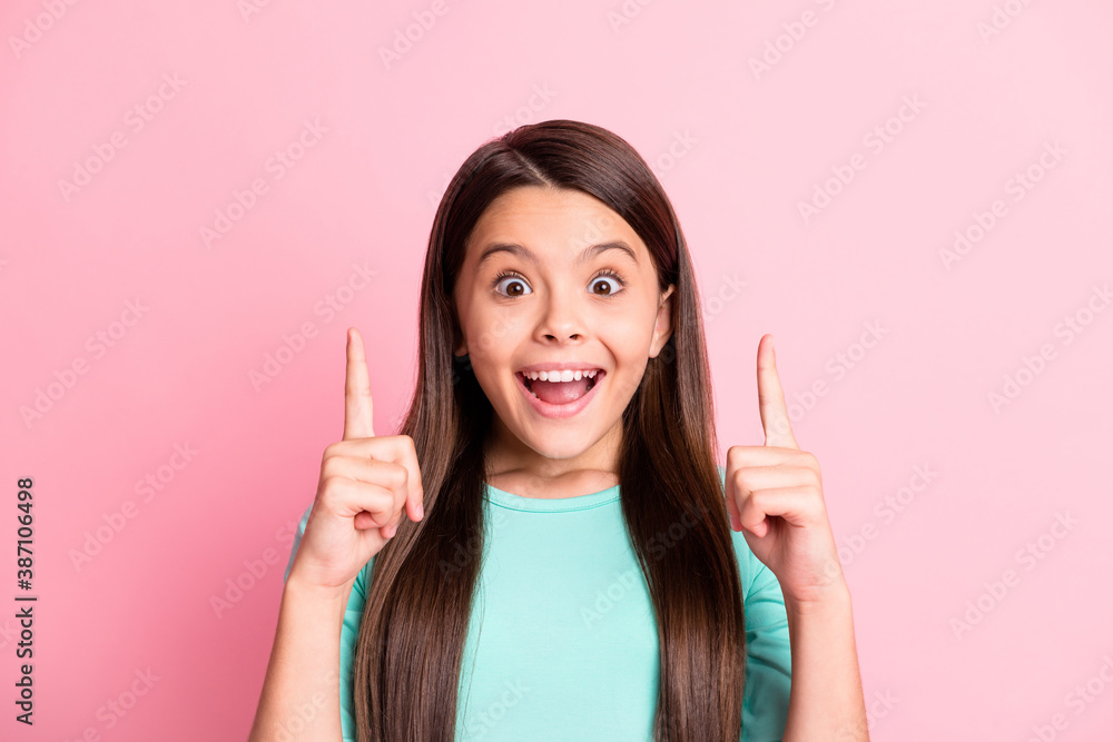 Close-up portrait of her she nice attractive pretty glad cheerful cheery long-haired girl pointing forefingers up copy space advert ad novelty isolated over pink pastel color background Close-up portrait of her she nice attractive pretty glad cheerful cheery long-haired girl pointing forefingers up copy space advert ad novelty isolated over pink pastel color background