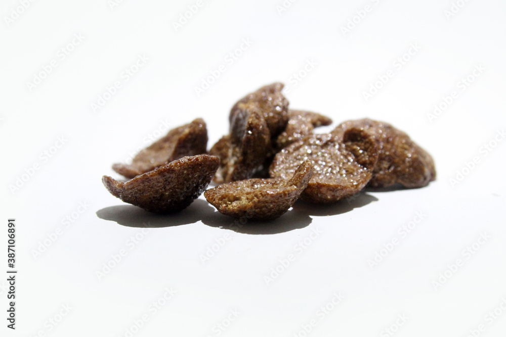 Close up of tasty and crunchy choco crunch on white background Close up of tasty and crunchy choco crunch on white background