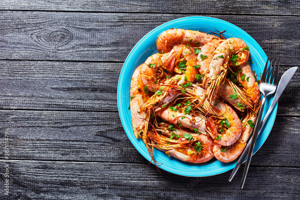 Garlic butter jumbo shrimps with lime and parsley Garlic butter jumbo shrimps with lime and parsley