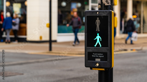 A pedestrian crossing showing the way forward