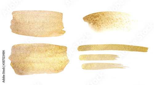 watercolor golden stains for new year or Christmas design, glottering gold shapes for frame or text, shiny decoration isolated on white backglound © katedeepomania