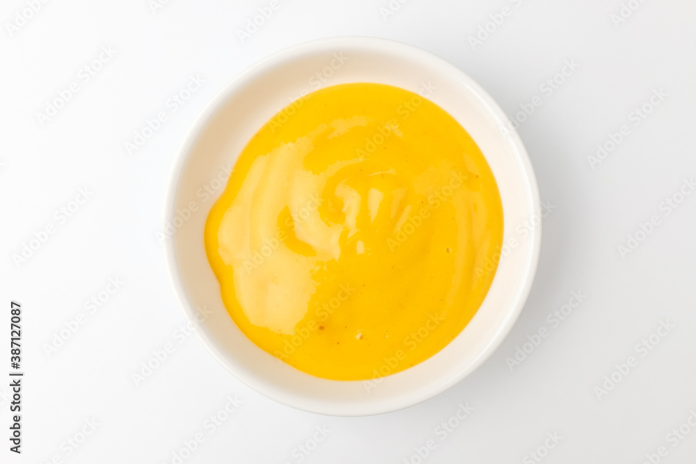 Mustard sauce on a white background Mustard sauce on a white background