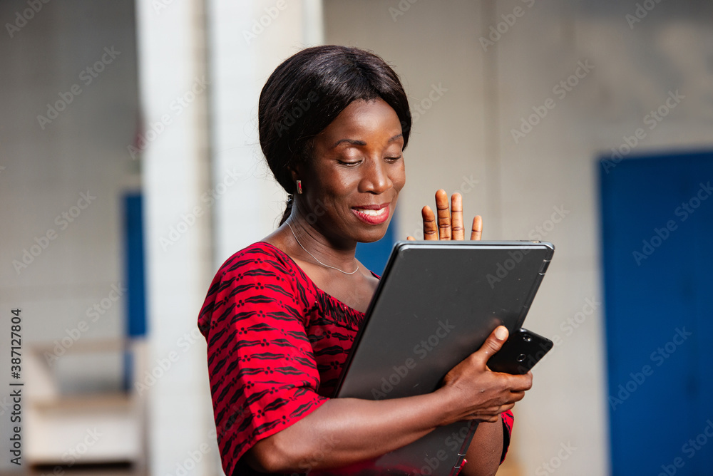 beautiful businesswoman holding a laptop beautiful businesswoman holding a laptop